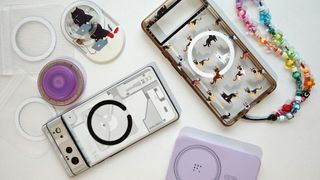 Various MagSafe accessories for Android phones on a white table.